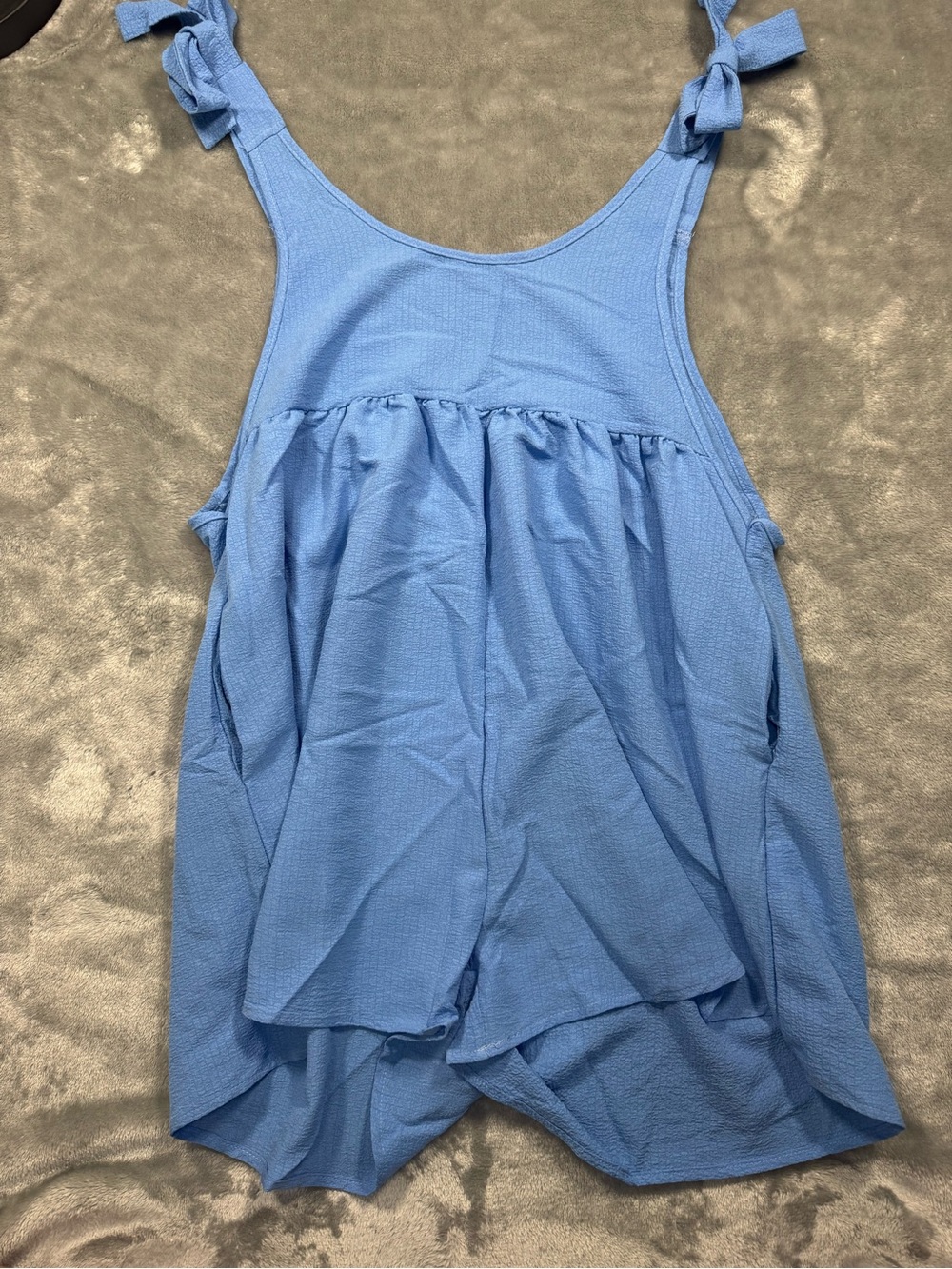 Light blue romper with bow ties